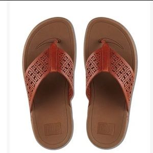 Woman’s fit flop sandals brand new in box never worn. Size 8.